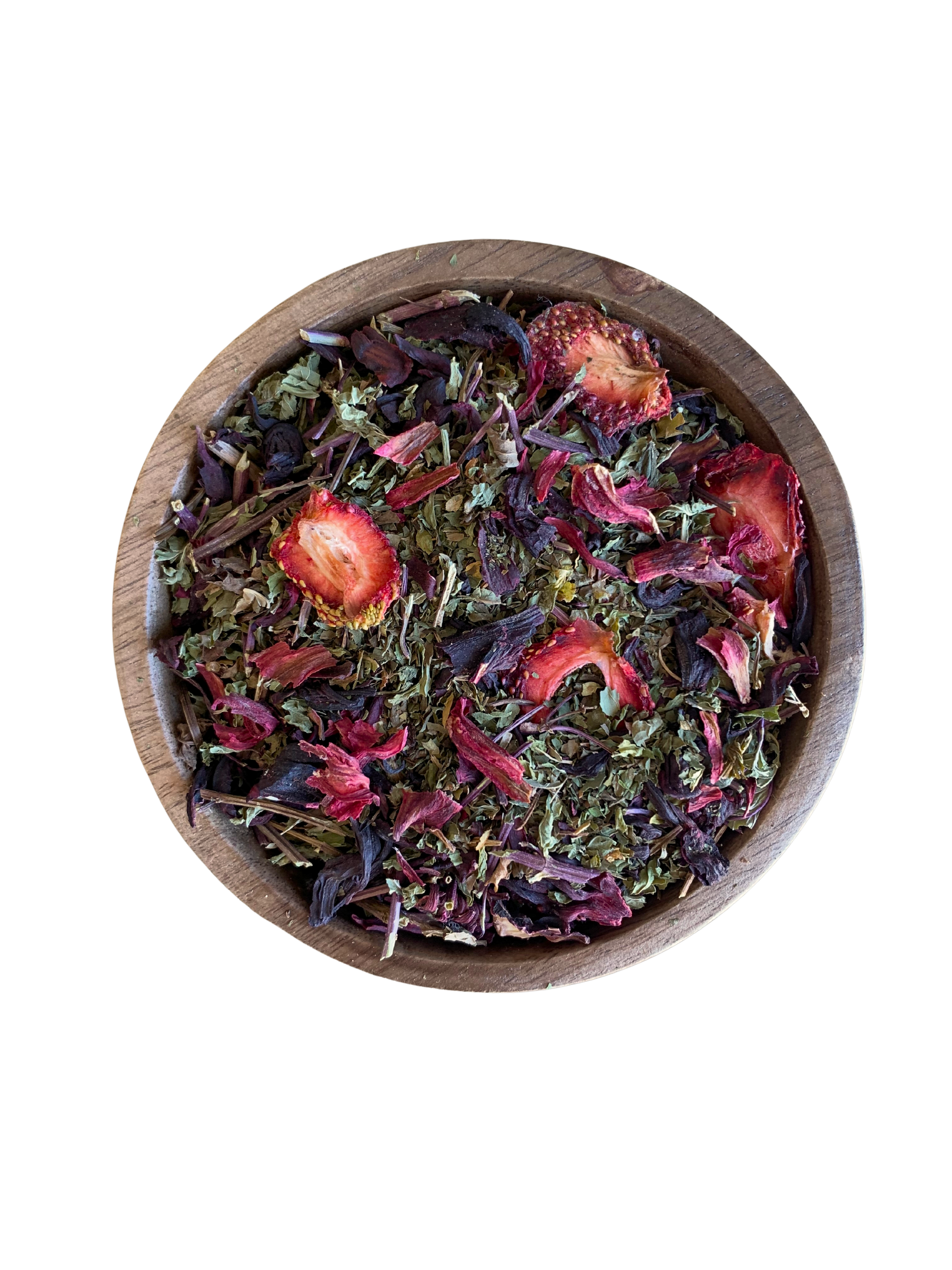 Wooden bowl filled with colorful dried herbs such spearmint, strawberries and hibiscus.